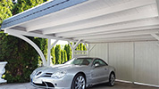 Carport 510x600 cm · Lärche ·  Schindelblende 2-reihig Echtschiefer · Sonderpfetten · Rückwand  · vom Kunden weß gestrichen