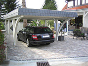 Carport 410x600 cm · Fichte · Schindelblende 2-reihig Echtschiefer · 2 Leimholzbögen · vom Kunden weiß gestrichen