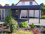 Carport 610x800 cm · Fichte · Schindelblende 2-reihig Echtschiefer · Abstellraum 200 cm · vom Kunden blau gestrichen