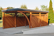 Carport 310x600 cm · Lärche · Schindelblende 1-reihig Echtschiefer · 1 Leimholzbogen · Massivzaun Ravenna
