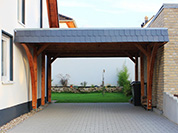 Carport 410x600 cm · Lärche · Schindelblende 2-reihig Echtschiefer · 2 Leimholzbögen