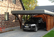 Carport 410x600 cm · Lärche · 2 Leimholzbögen · Massivzaun Ravenna · vom Kunden braun gestrichen