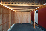 Carport 310x800 cm · Lärche · Schindelblende 2-reihig Echtschiefer · Abstellraum ca. 250 cm · linke Längsseite geschlossen (Wandelemente)